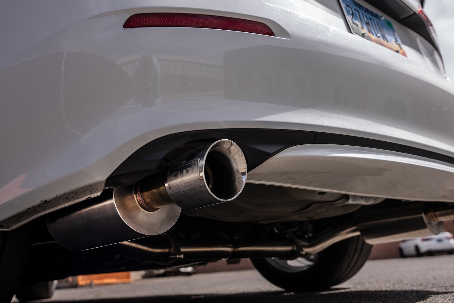 2022-civic-SI-rear-exhaust-on-car-on-a-lift